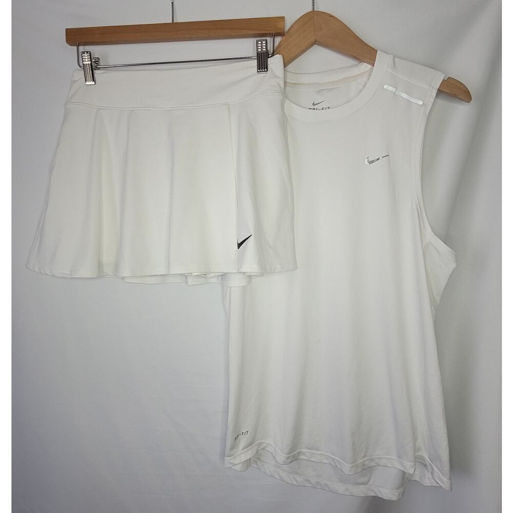 Nike- Women's 2 piece skirt and tank outfit- white in color-size small
